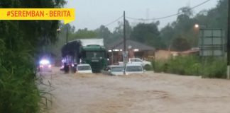 Bomba Selamatkan Mangsa Yang Teperangkap Dalam Banjir Di Jalan Seremban-Port Dickson